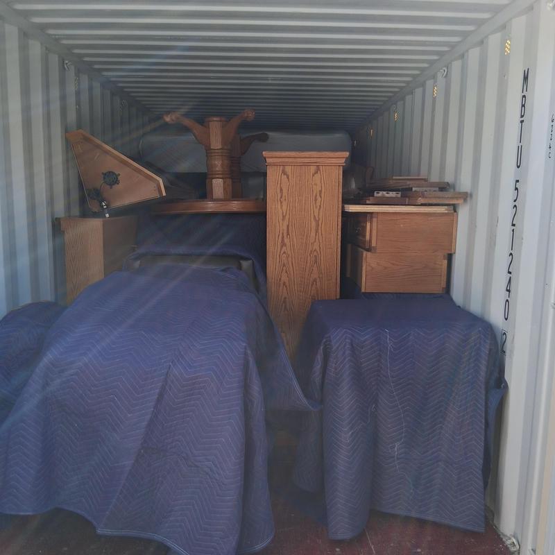 Wooden furniture and appliances in storage container Wooden furniture and appliances in storage container