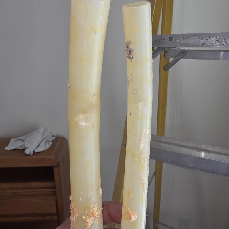 Damaged PEX pipes cut out for replacement