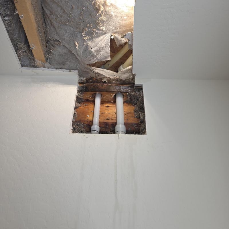 Pex water lines with 90-degree fittings in ceiling cavity