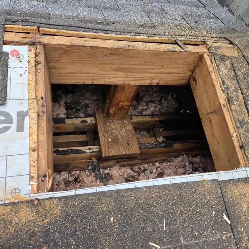 Roof decking replacement with exposed wooden frame and insulation