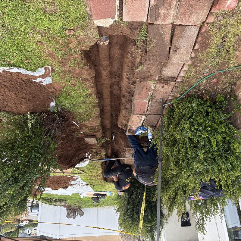 Cast iron sewer line dig up and repair in yard