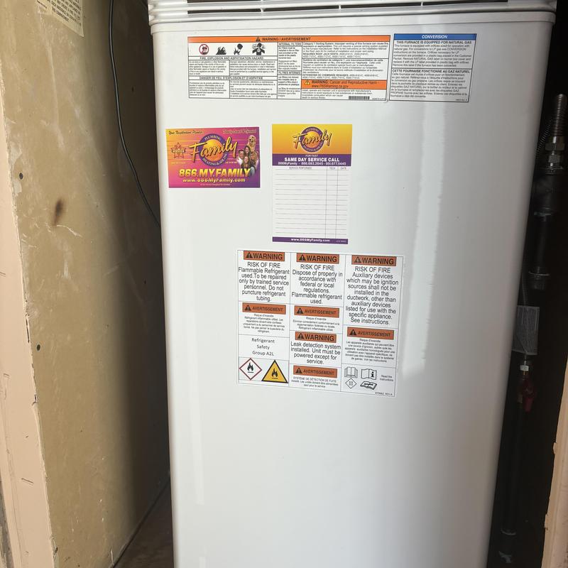 Coleman downflow gas furnace with warning labels