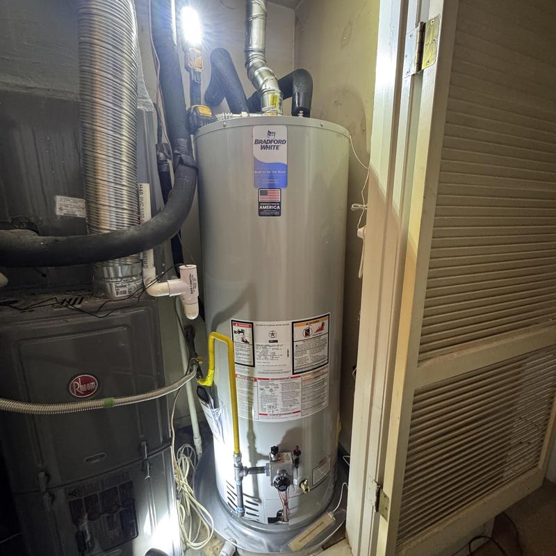 50-gallon gas water heater in house closet