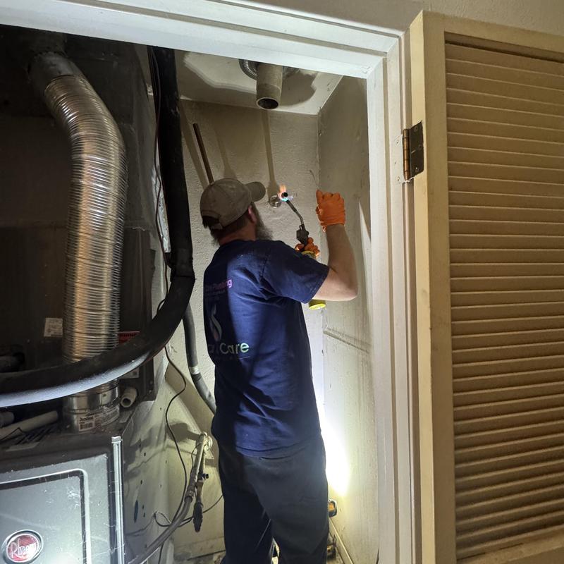 Gas water heater installation in utility closet