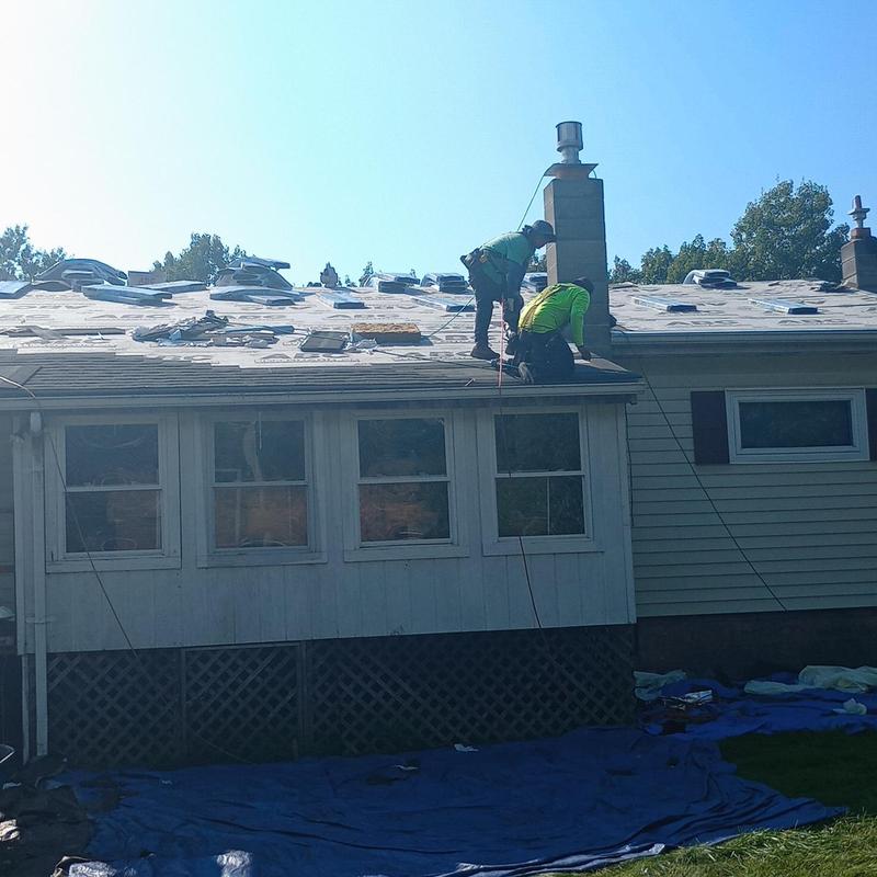 Shingle roof installation with chimney work in Vermont