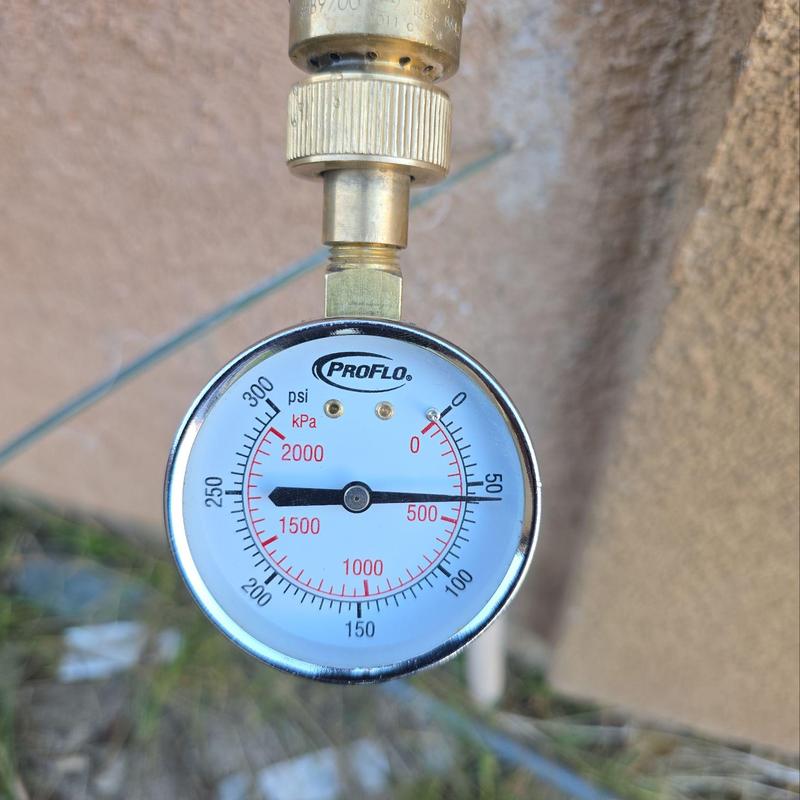 Water heater pressure gauge reading at 50 psi