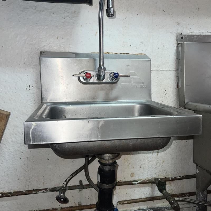 Wall mount hand sink faucet with hot and cold handles