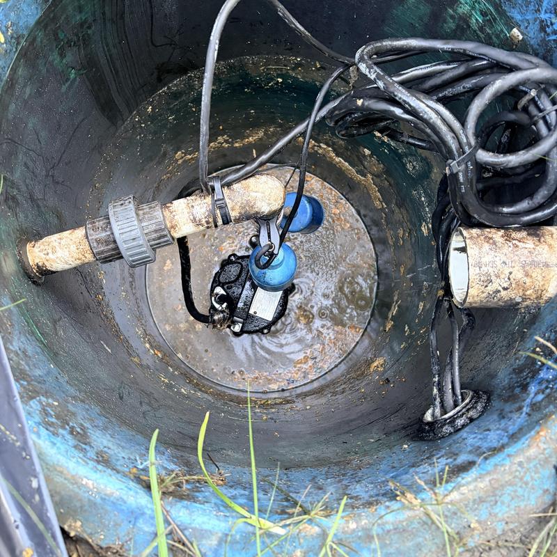 3 HP grinder pump and alarm floats in basin