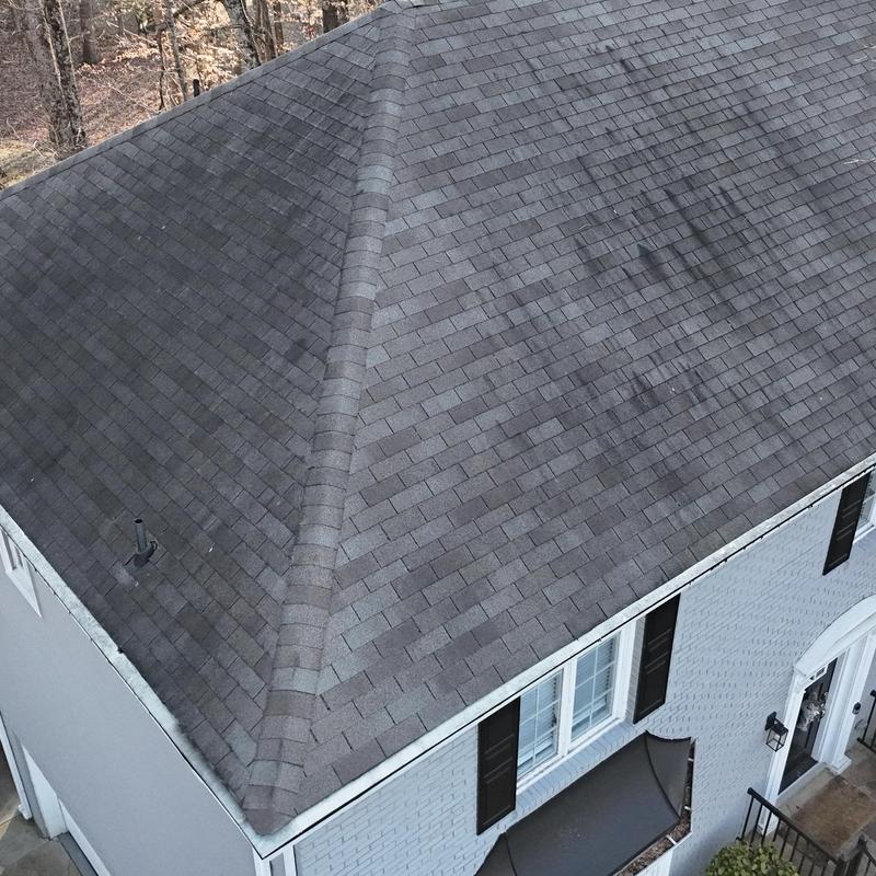 Window sill leak with stained awning and roof inspection