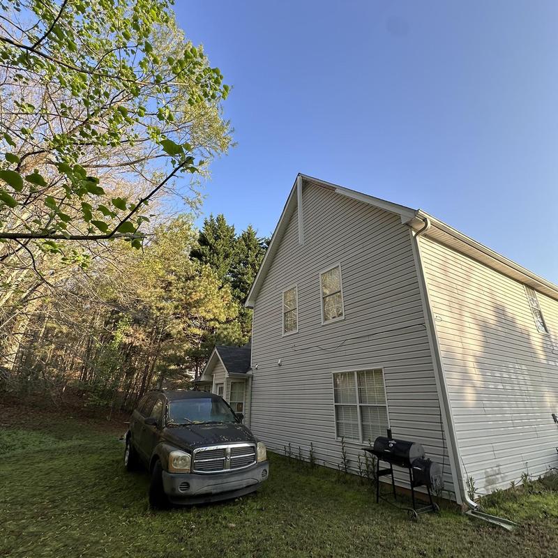 Fascia metal damage on house exterior wall