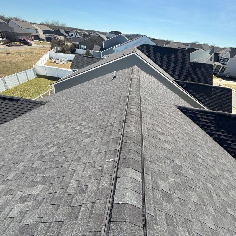 Asphalt shingle roof with hail damage inspection