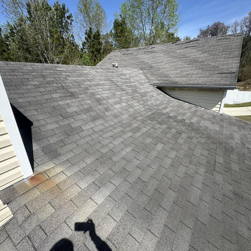 Asphalt shingle roof with aging and minor damage