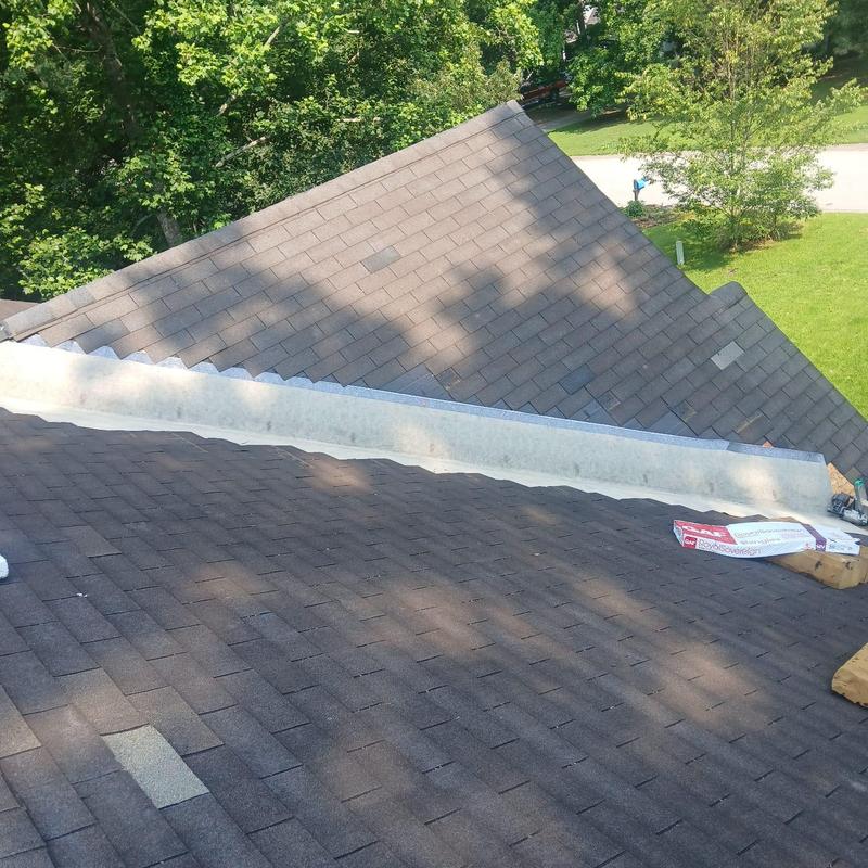 Valley flashing installation on asphalt shingle roof