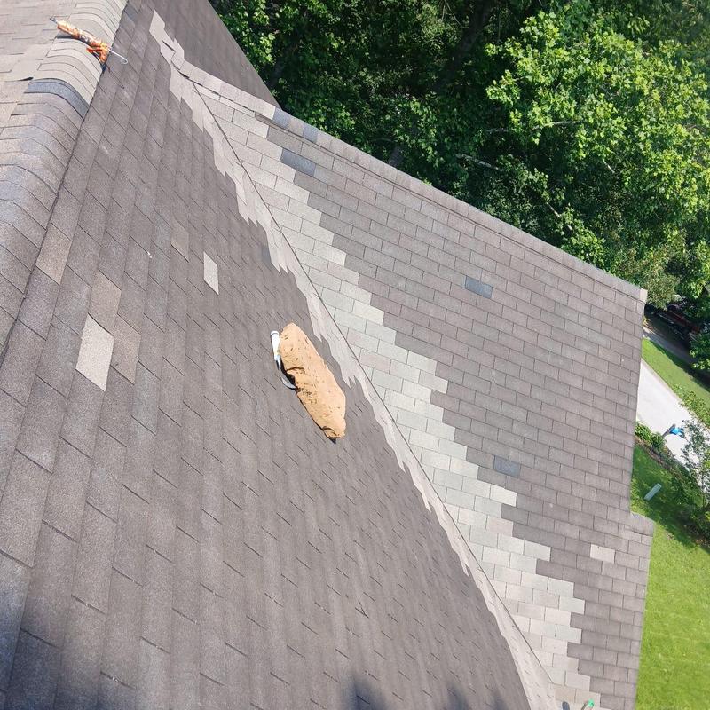 Roof valley with new flashing and asphalt shingles