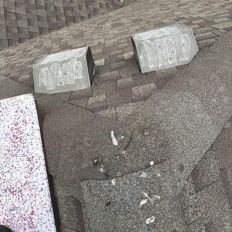 Roof shingles granule loss and vent flashing on asphalt roof