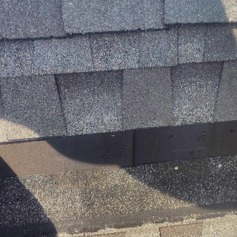 Roof shingles with granule loss from hail damage
