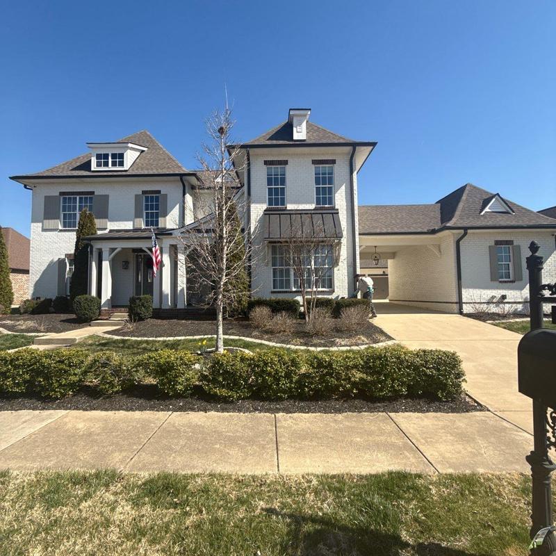 Asphalt shingle roof with hail damage and flashing check