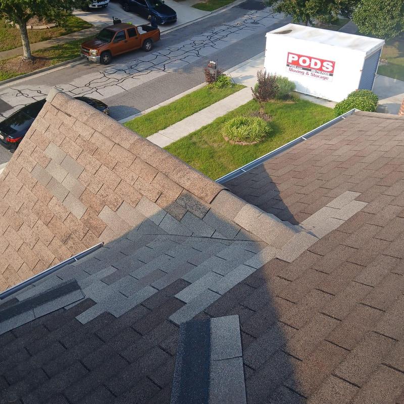 Roof valley with new shingles and flashing installation