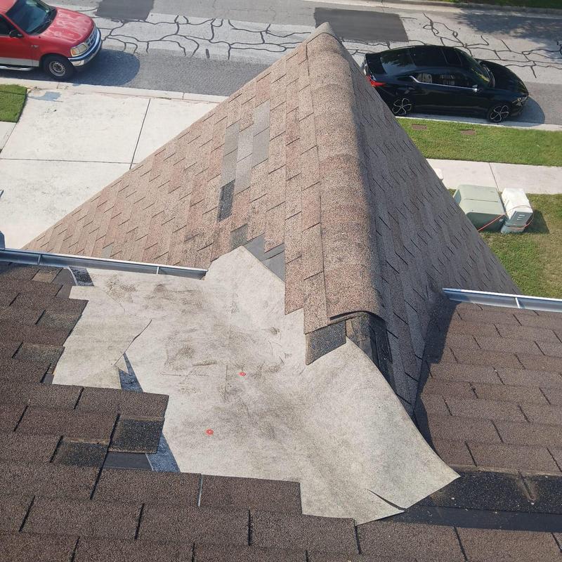 Roof valley with replaced decking and new underlayment