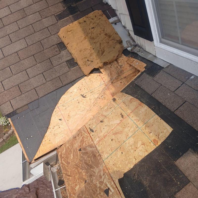 Roof decking and shingles replacement at valley junction