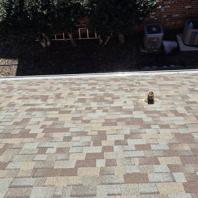 Asphalt shingle roof with vent pipe and metal drip edge