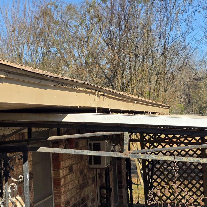 Roof edge with hail storm damage and wear