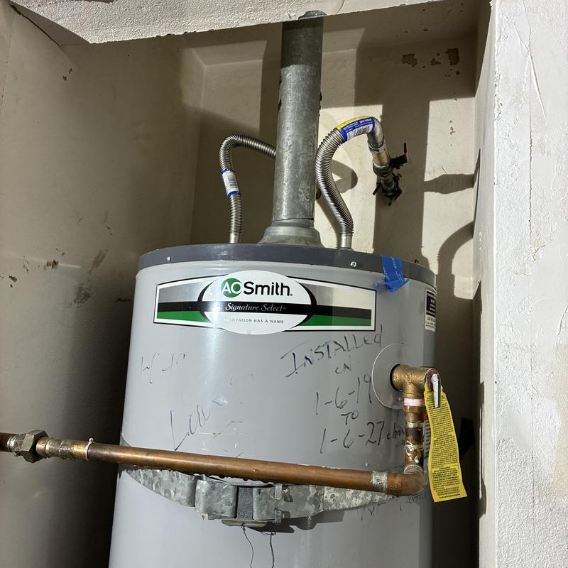 Water heater with broken ball valve leak in wall cavity