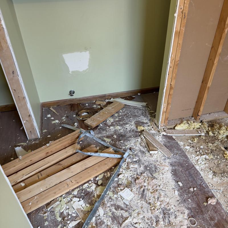 Wall framing and drywall debris during home remodel Wall framing and drywall debris during home remodel