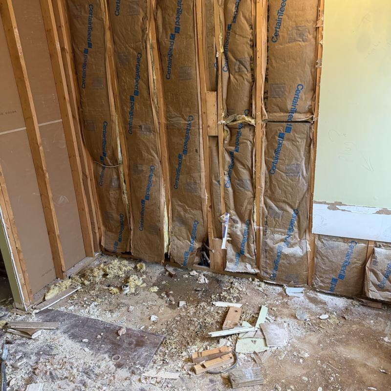 Wall insulation removal and interior wall framing exposed Wall insulation removal and interior wall framing exposed