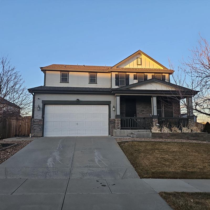 Shingle roof with minor ridge cap damage and resealing needed Shingle roof with minor ridge cap damage and resealing needed