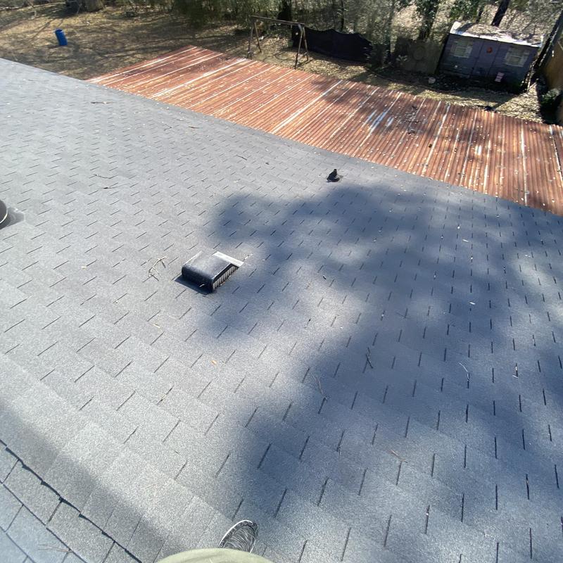 Asphalt shingle roof with vents during inspection Asphalt shingle roof with vents during inspection