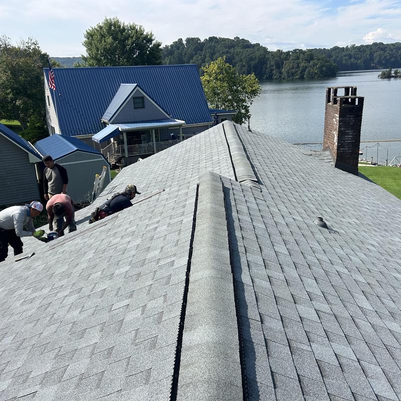 Atlas Coastal Granite shingles replacement on lake house roof