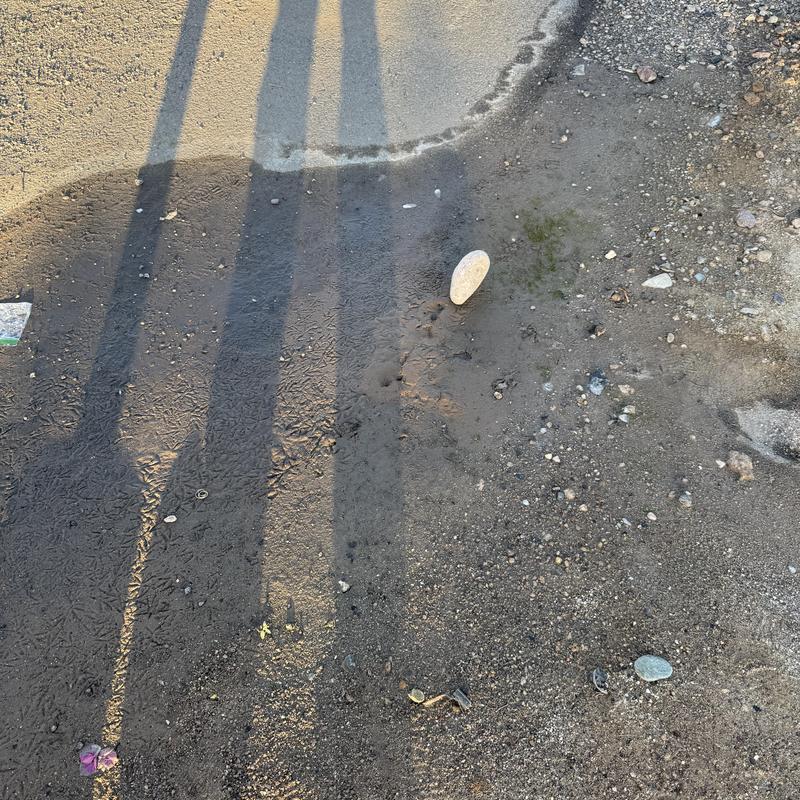 PVC water main line break with wet dirt and gravel