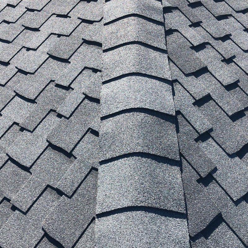 GAF Grand Sequoia shingles in Charcoal on roof ridge