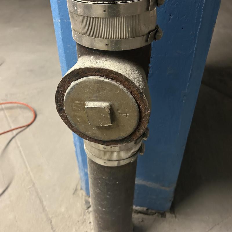 Sanitary sewer cleanout cap with clamps and pipe