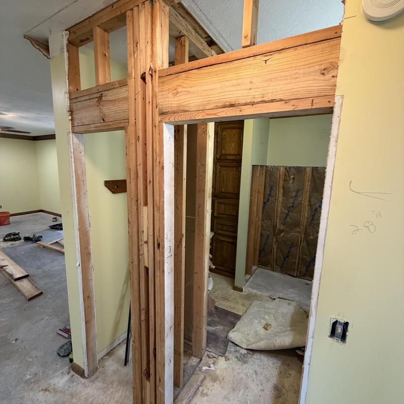 Door frame and wall studs installation in hall and bathroom Door frame and wall studs installation in hall and bathroom