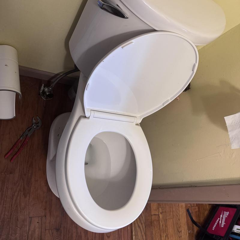 Gerber toilet with trip waste overflow installation
