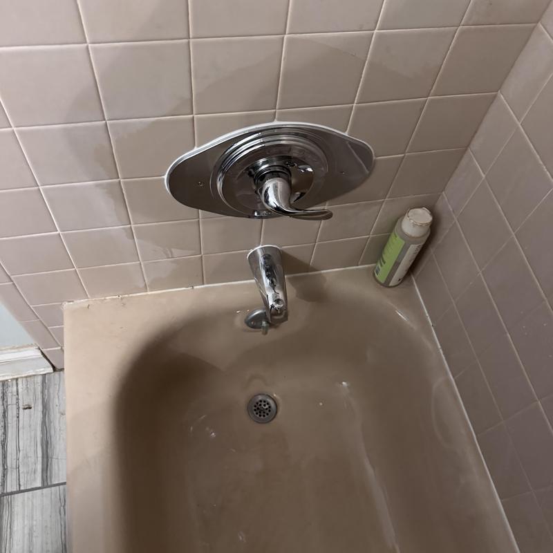 Delta single-handle tub shower valve installation in bathtub