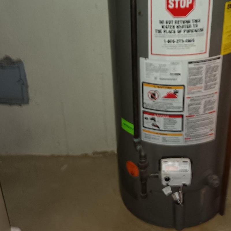 Water heater with safety and usage labels