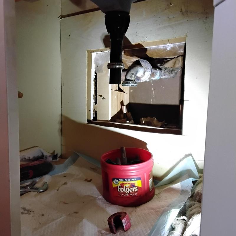 Copper water lines behind bathroom sink wall cut open Copper water lines behind bathroom sink wall cut open