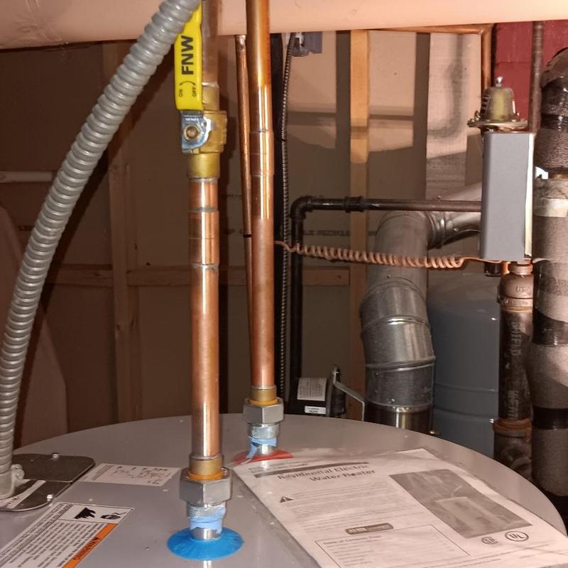 50-gallon electric water heater with copper piping