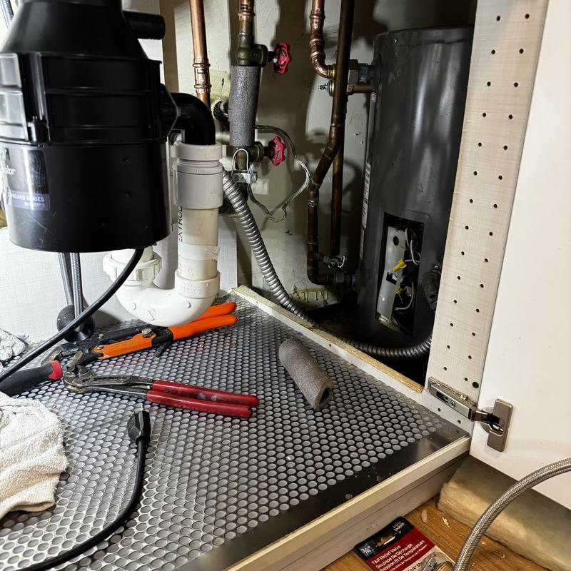 Electric hot water heater anode rod replacement under sink