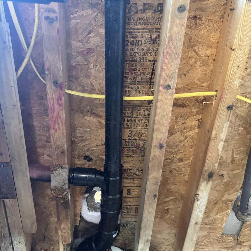 Kitchen sink ABS drain pipe replacement under floor joists