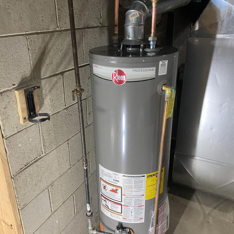 Rheem hot water heater replacement in basement