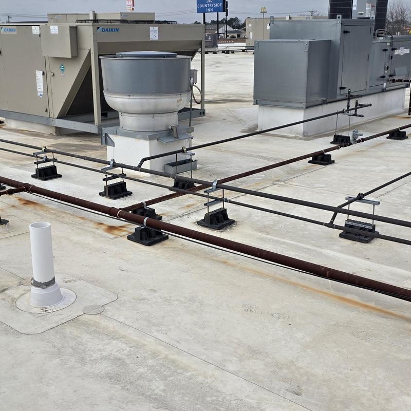 Commercial rooftop HVAC units with ventilation system