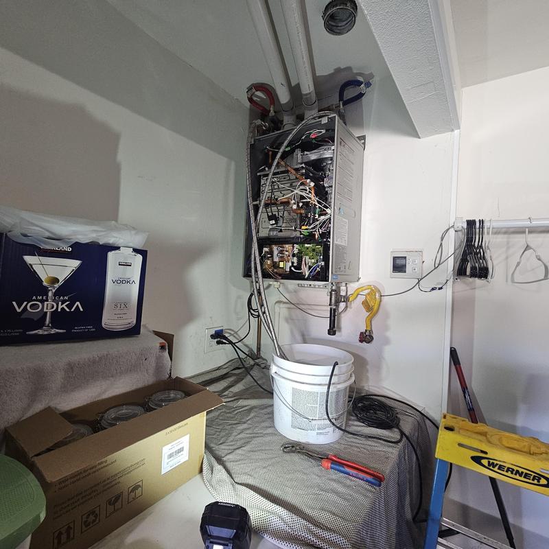 Noritz NRC111DV tankless water heater flush in progress