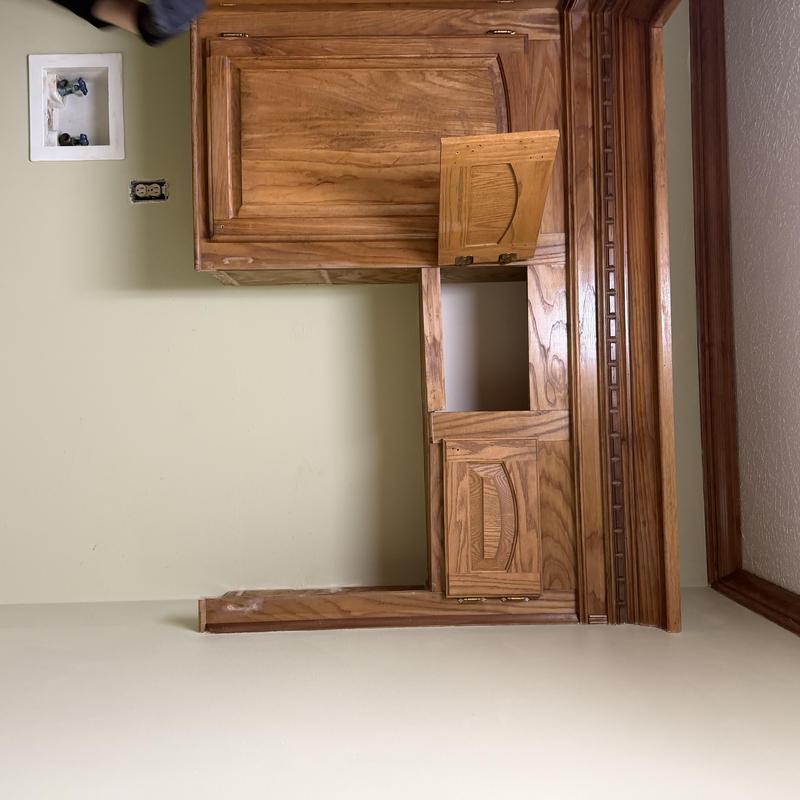 Refrigerator cabinet trim and door removal in kitchen Refrigerator cabinet trim and door removal in kitchen