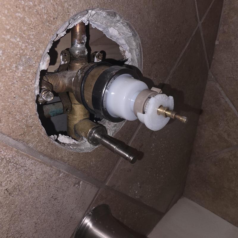 Delta tub cartridge valve exposed in wall cavity