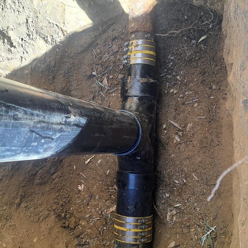Cast iron sewer pipe with epoxy resin liner under slab