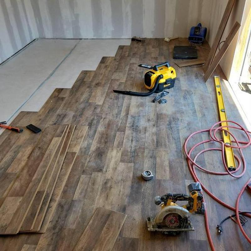 Vinyl plank flooring installation with power tools